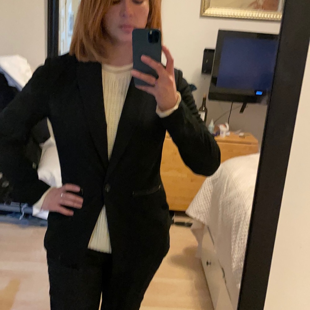 Rachel Roy black blazer with zippers on pockets.